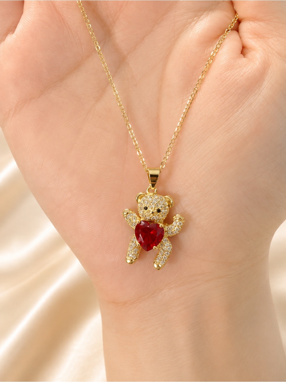Gold Teddy Bear Pendant Necklace with Red Heart Gem